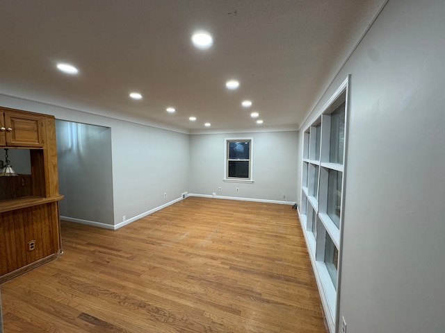 unfurnished living room with light hardwood / wood-style floors