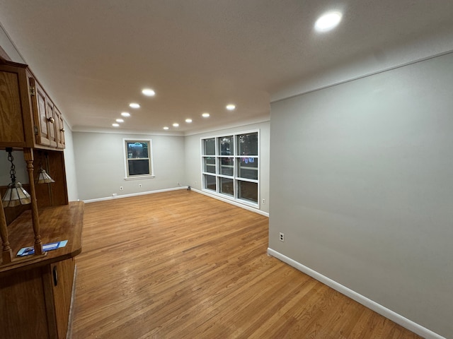 unfurnished living room featuring light hardwood / wood-style floors