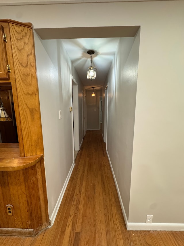 hall with light wood-type flooring