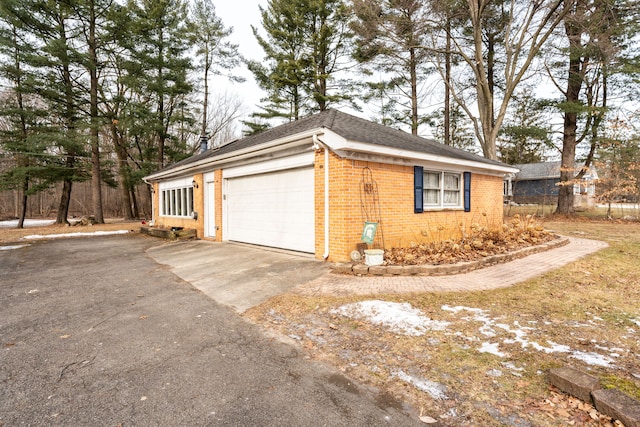 view of property exterior with a garage