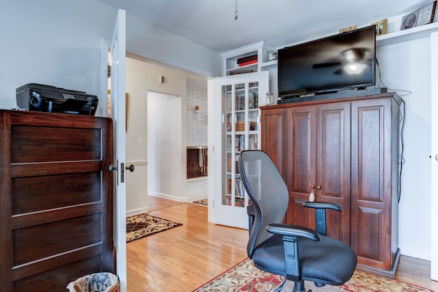 office area featuring light hardwood / wood-style flooring