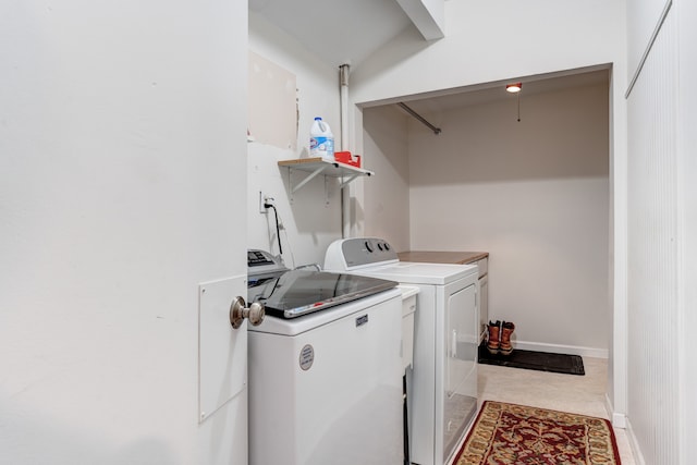 laundry room with washing machine and dryer