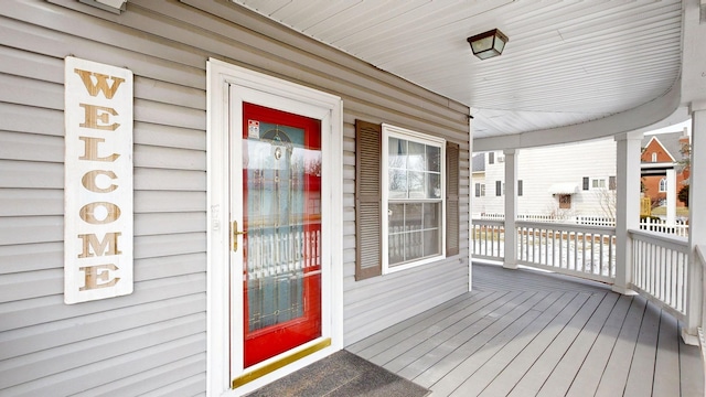 wooden terrace featuring a porch