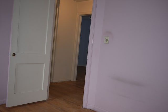 hallway with light wood-type flooring