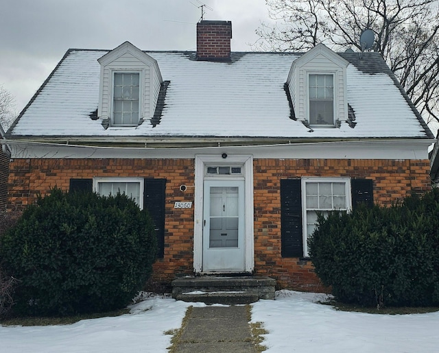 view of new england style home