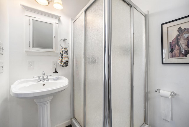 bathroom with an enclosed shower