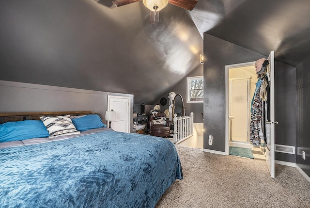 carpeted bedroom with vaulted ceiling and ceiling fan