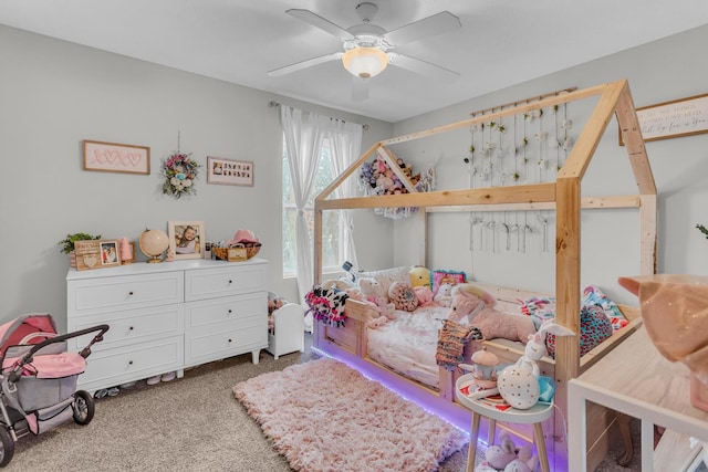 carpeted bedroom with ceiling fan