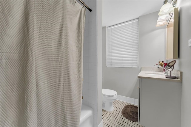 bathroom with tile patterned floors, toilet, and vanity