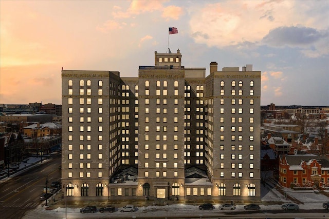 view of outdoor building at dusk