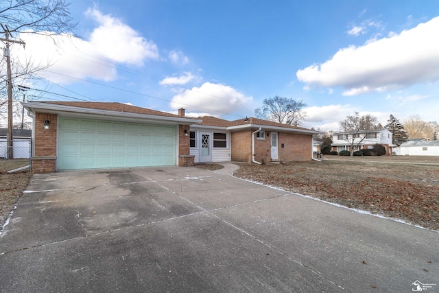 single story home featuring a garage