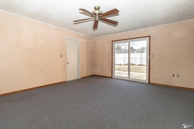 unfurnished room featuring ornamental molding, ceiling fan, and carpet