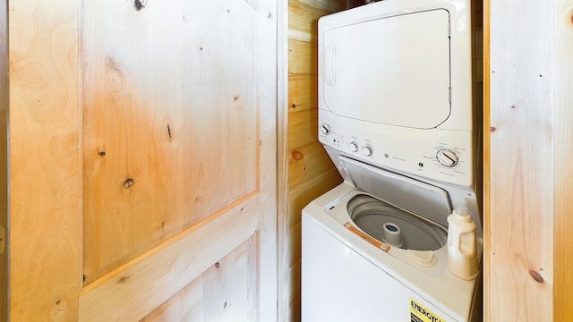 washroom with laundry area and stacked washer and dryer