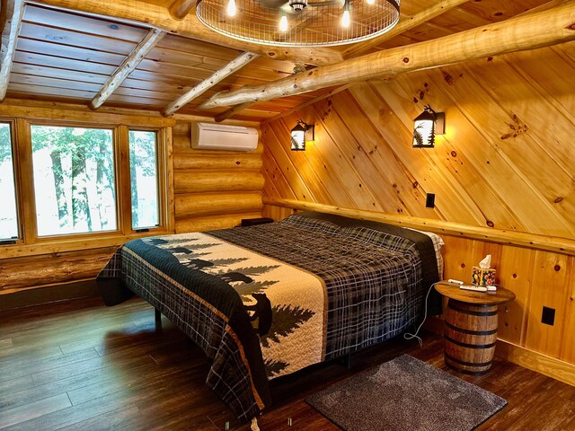 bedroom with an AC wall unit, wood ceiling, hardwood / wood-style floors, beam ceiling, and log walls