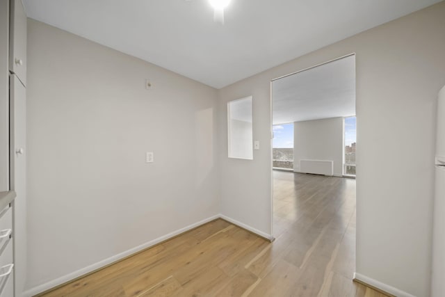 empty room featuring light hardwood / wood-style floors