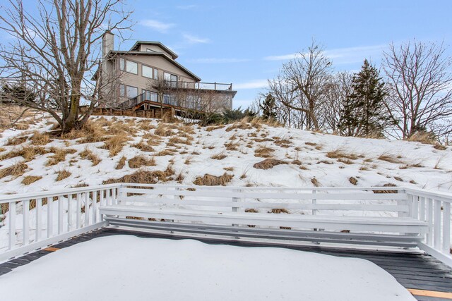 view of yard layered in snow