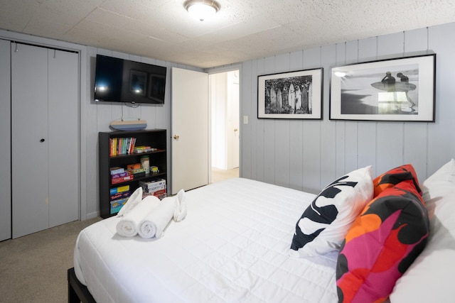 carpeted bedroom featuring a closet