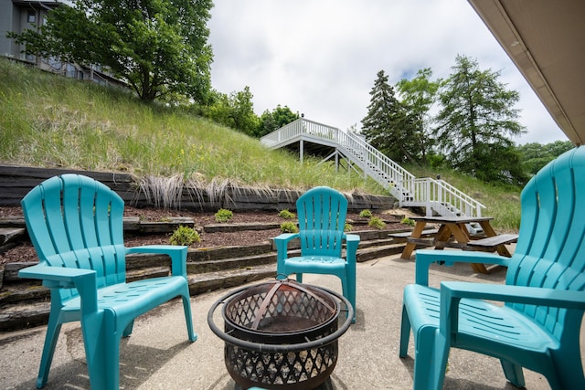 view of patio featuring a fire pit