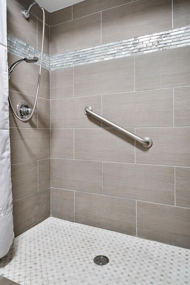 bathroom with a shower with shower curtain