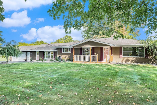 single story home featuring a garage, a front lawn, a chimney, and a porch