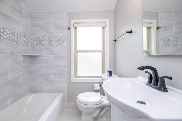 full bathroom featuring vanity, shower / washtub combination, a wealth of natural light, and toilet