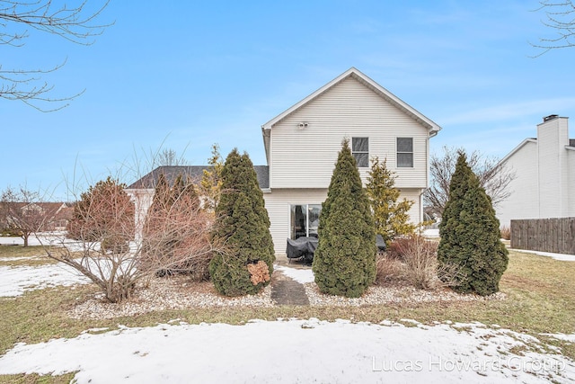 view of snow covered property