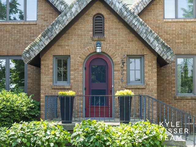 2346 Lake Dr SE, East Grand Rapids, MI 49506 - doorway to property with brick siding