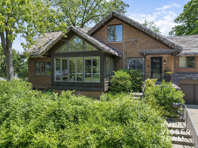 2346 Lake Dr SE, East Grand Rapids, MI 49506 - view of front of home featuring brick siding