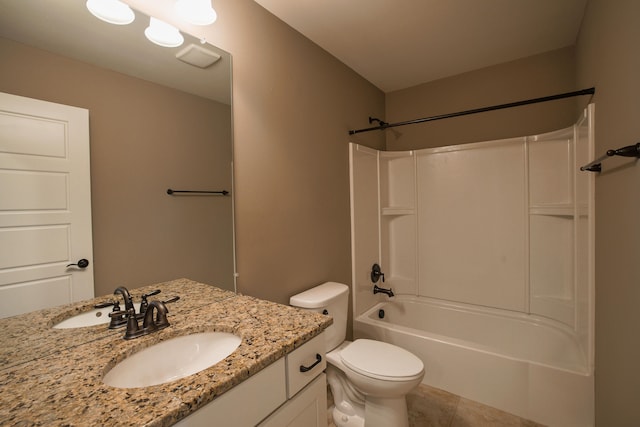 full bathroom featuring vanity, tile patterned floors, bathtub / shower combination, and toilet