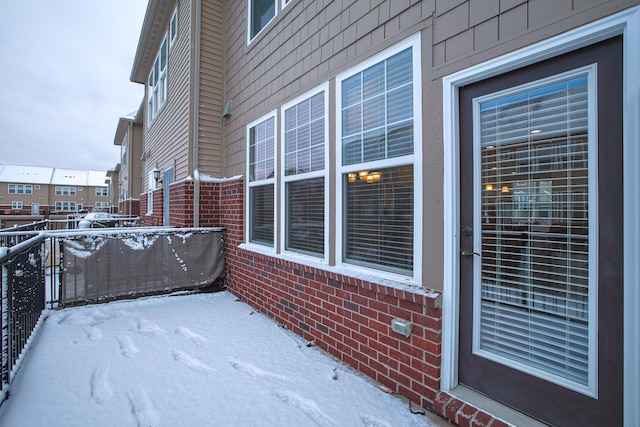 view of snow covered patio