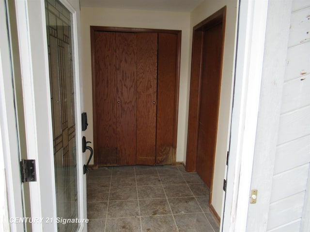 corridor with tile patterned floors