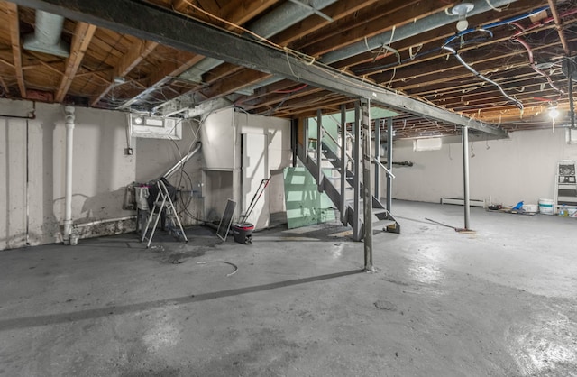 basement featuring baseboard heating