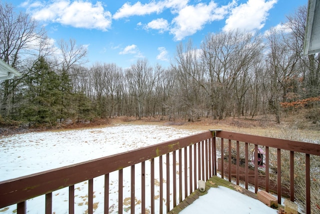 view of snow covered deck