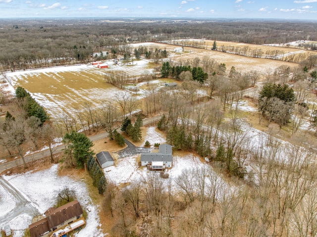 snowy aerial view with a rural view