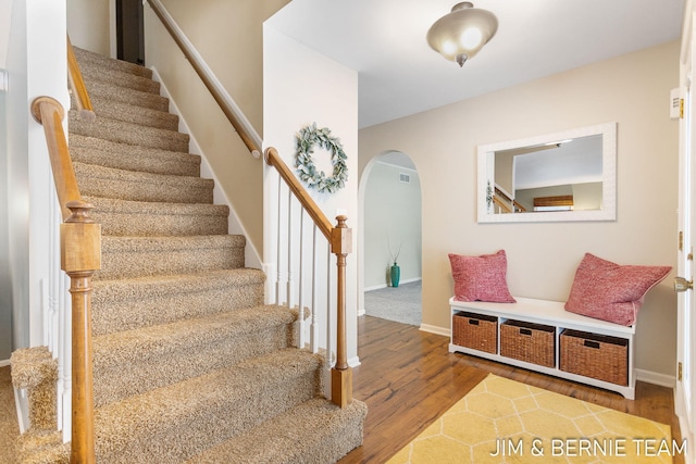 foyer entrance with wood-type flooring