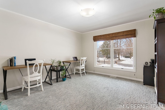 carpeted office space with crown molding