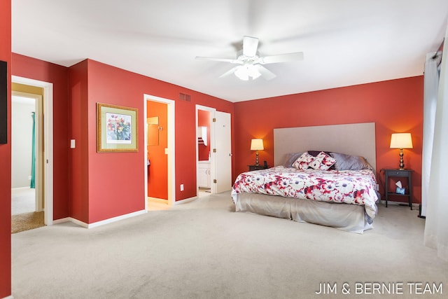 bedroom with light carpet, ensuite bath, and ceiling fan