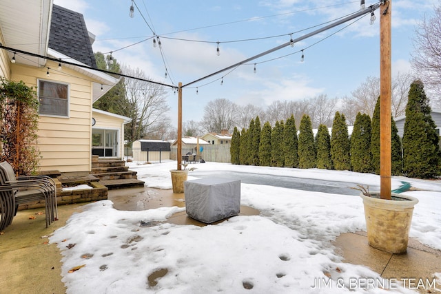 view of yard covered in snow