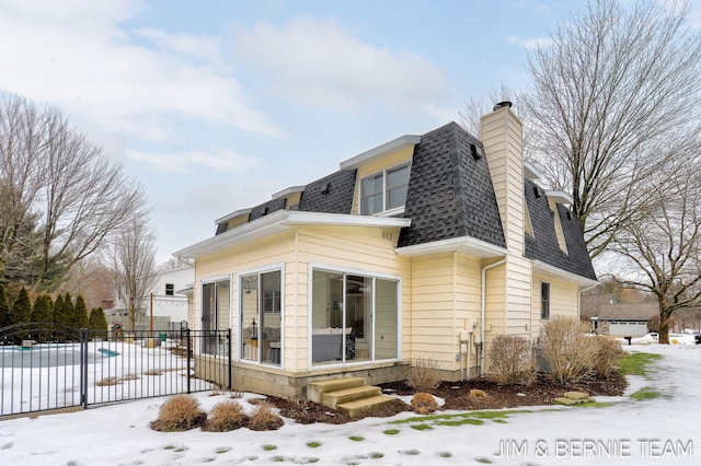 view of snow covered property