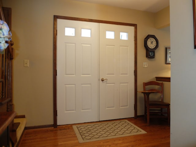 entrance foyer featuring hardwood / wood-style floors