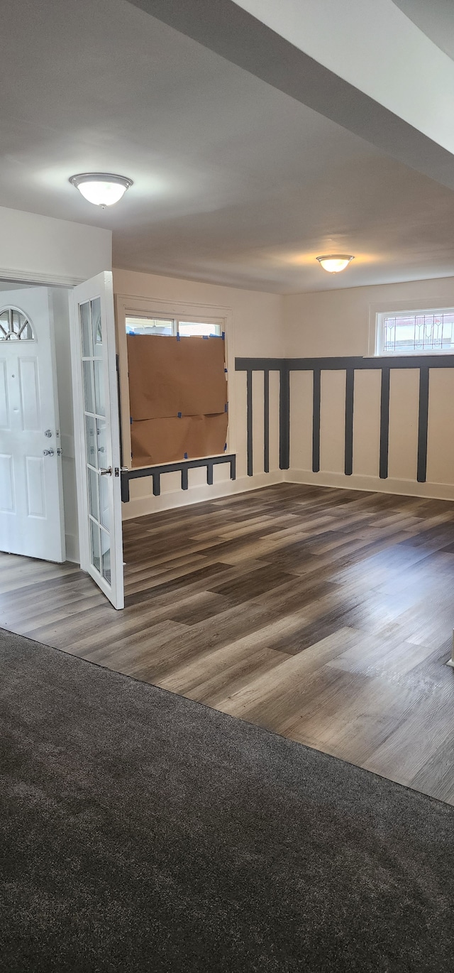 empty room featuring dark wood-type flooring