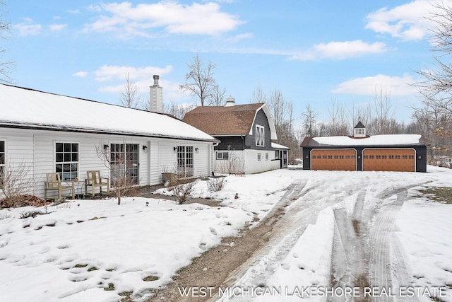 view of snow covered house