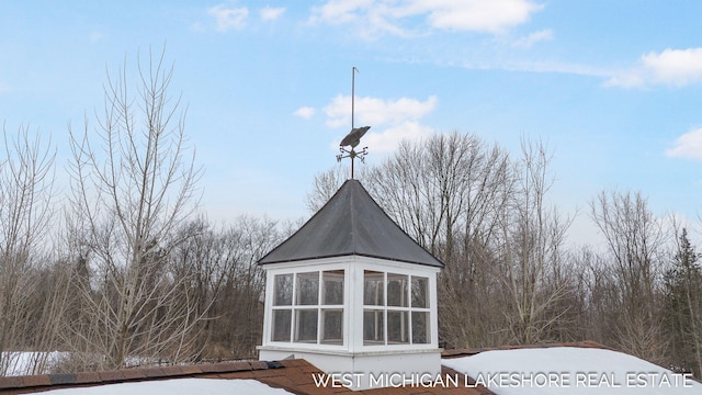 exterior space featuring a sunroom