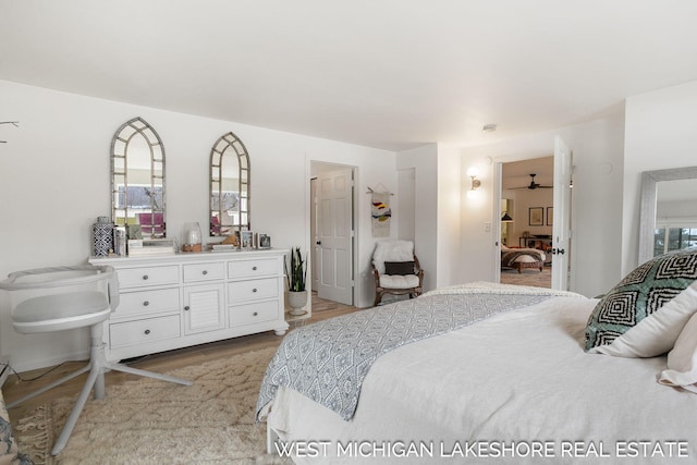 bedroom with light wood-type flooring