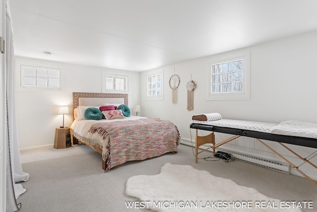 bedroom featuring a baseboard radiator and carpet