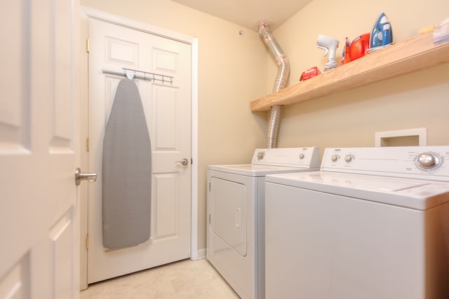 laundry room with separate washer and dryer