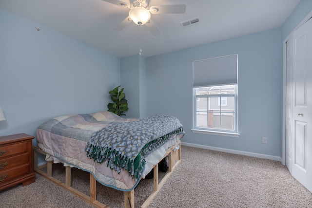 bedroom featuring ceiling fan and carpet flooring