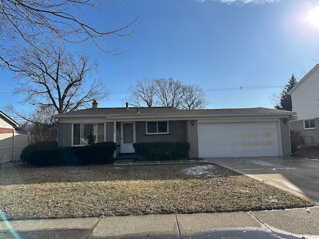 single story home featuring a garage