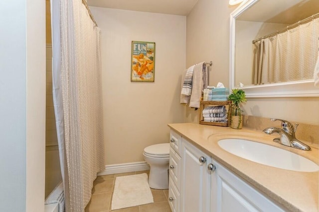 bathroom featuring tile patterned flooring, vanity, a shower with curtain, and toilet