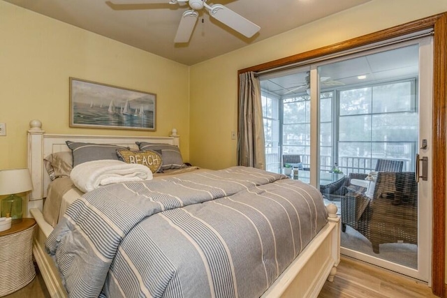 bedroom with light hardwood / wood-style flooring, ceiling fan, and access to outside